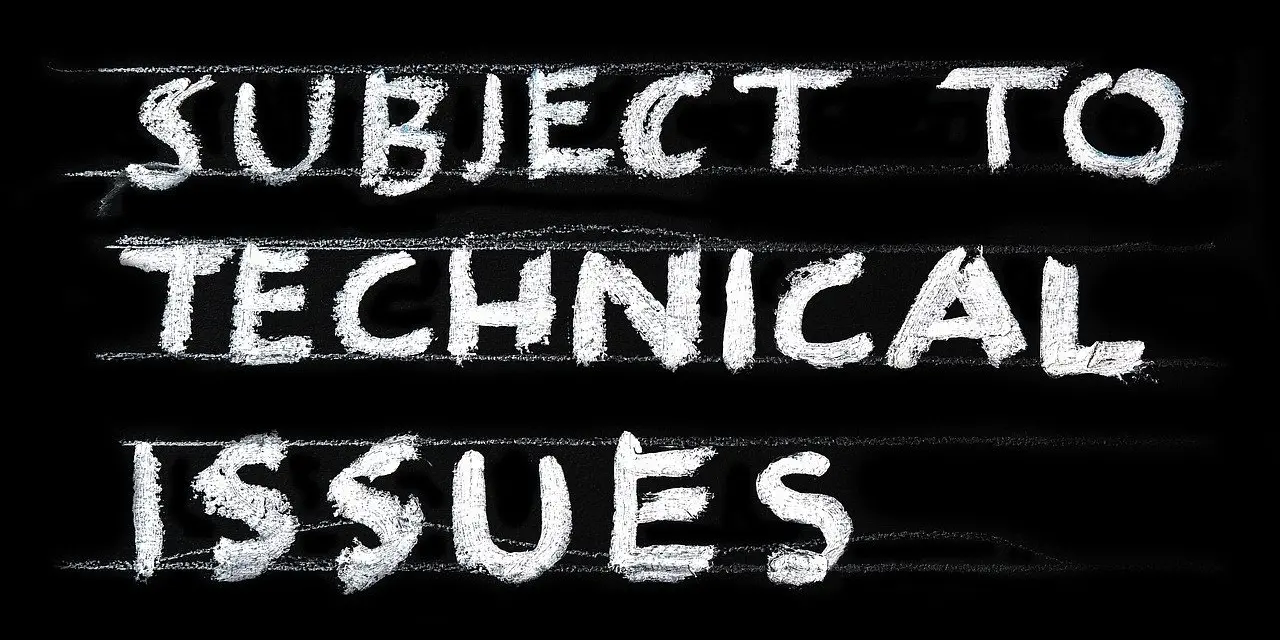 A chalkboard displaying the message "subject to technical issues" in capital letters